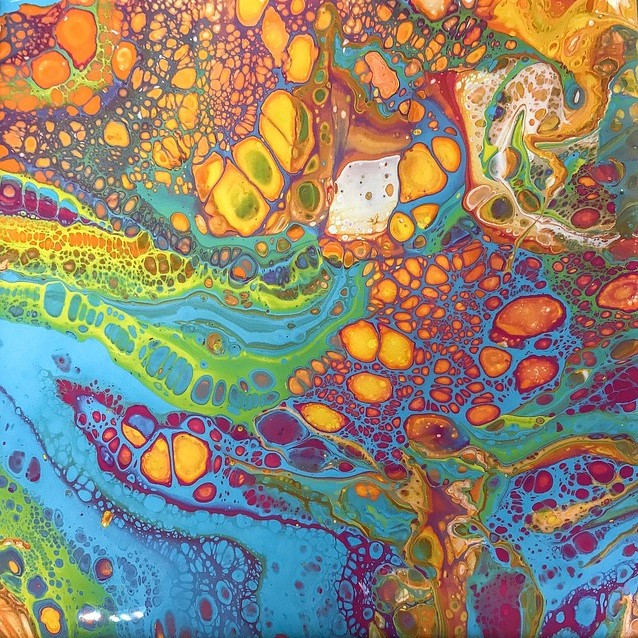 bright multicolored poured paint