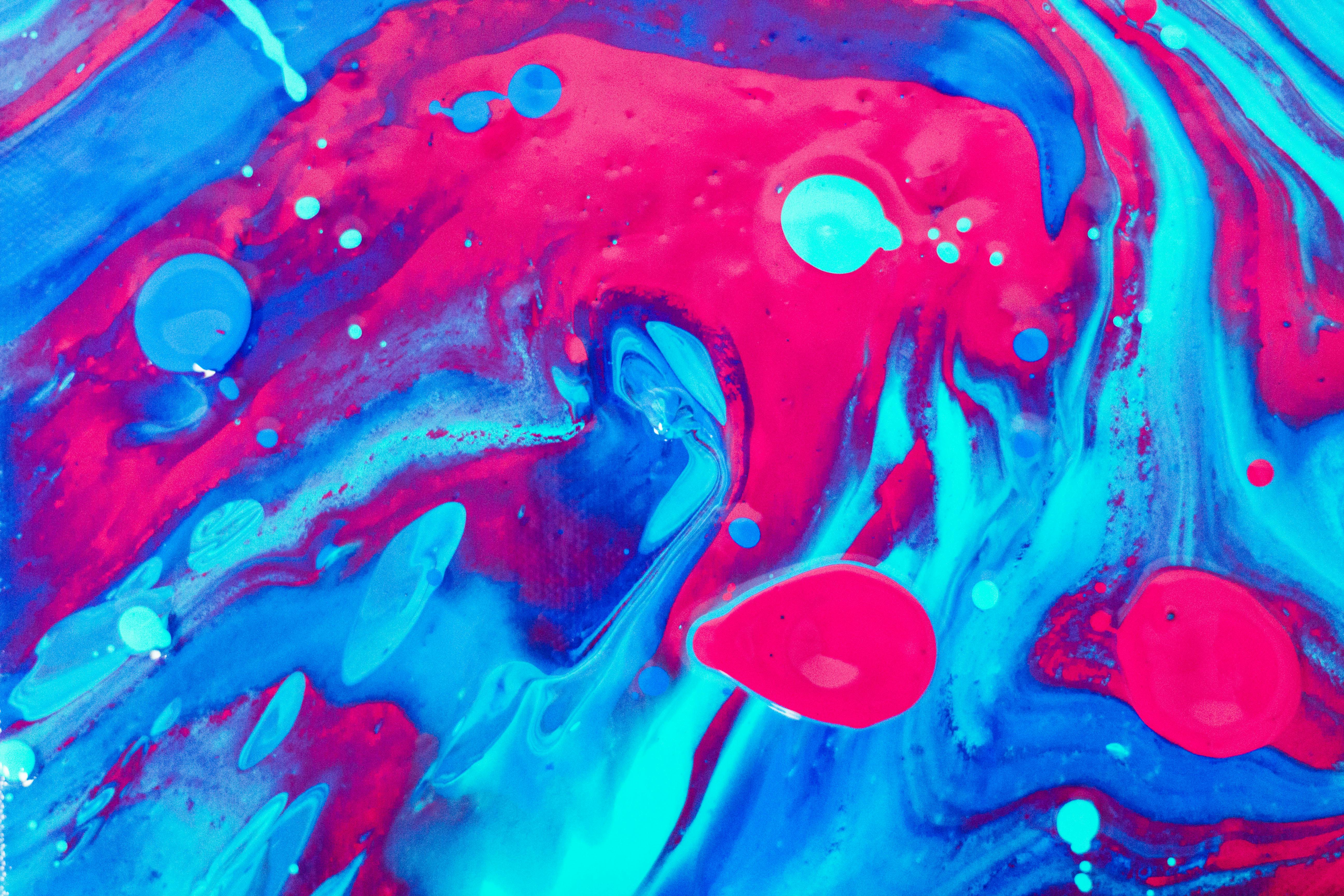 neon blue and pink swirled painting